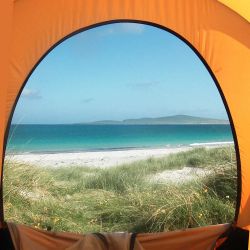 view of the beach from a tent